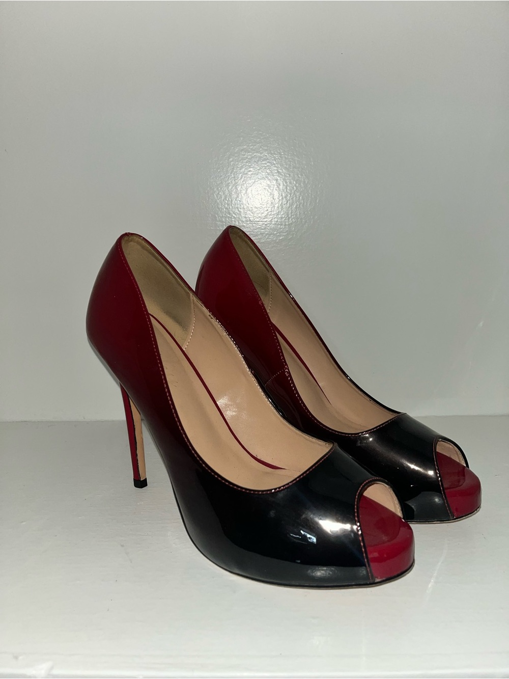 Red and black ombré covered platform peep toe pumps
